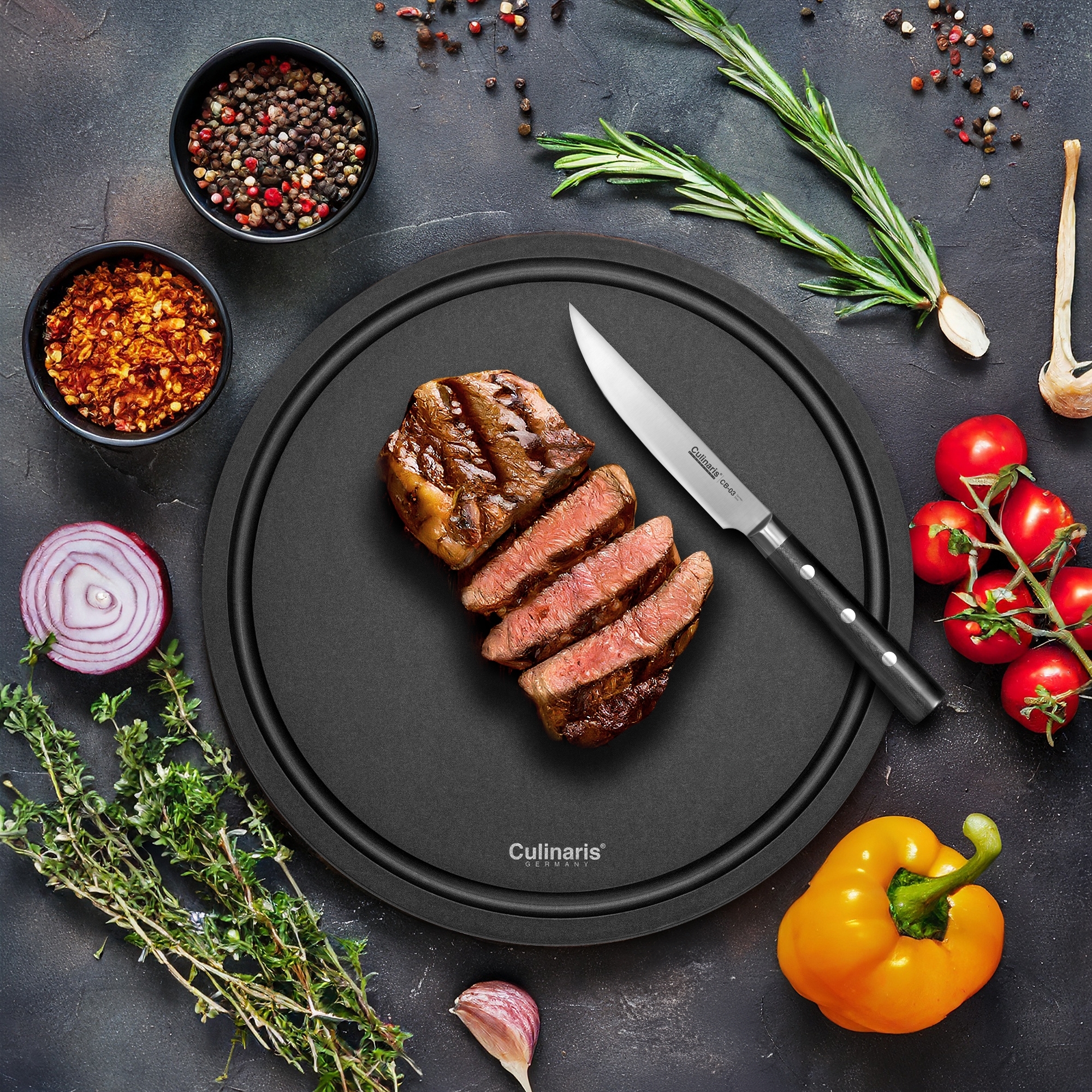 NERO chopping board Ø 30 x 0.9 cm + NEROCURA wood balm | Culinaris